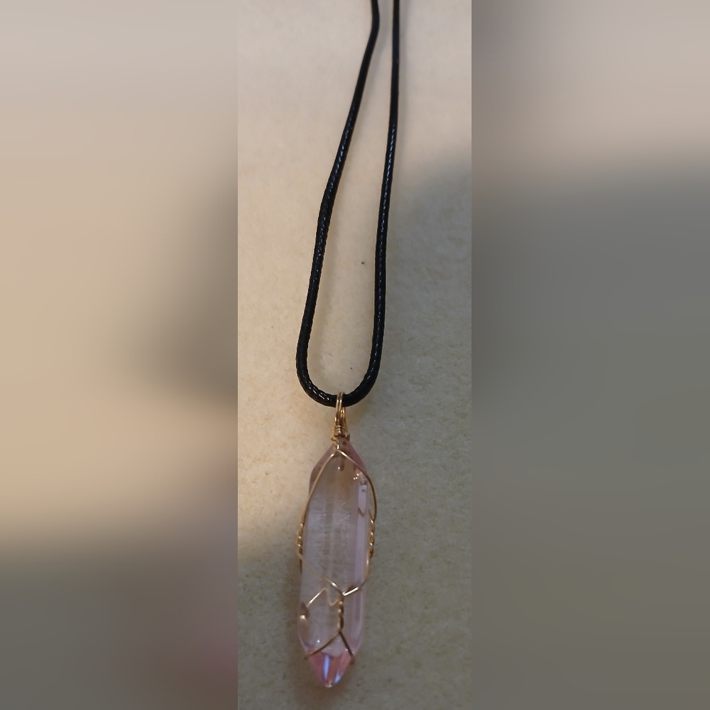 NWT Handcrafted Elegant wire-wrapped pink rose quartz crystal.
